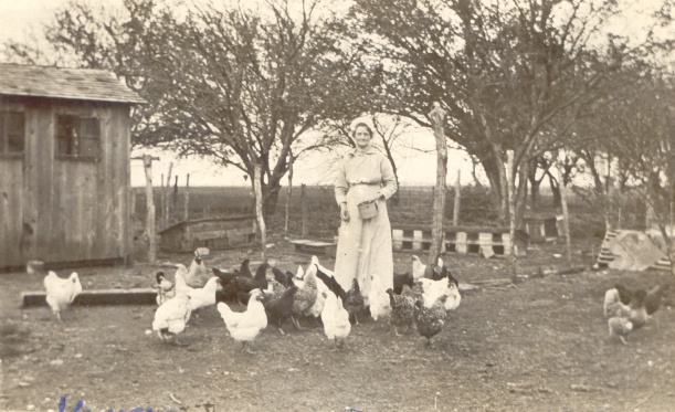 Margaret (Maggie) Dugan with chickens1909 Kansas